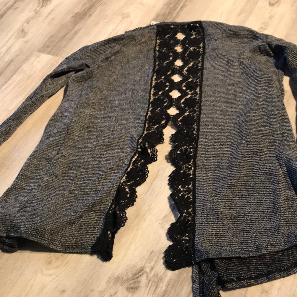 Super cute lace back. Used but in good condition.